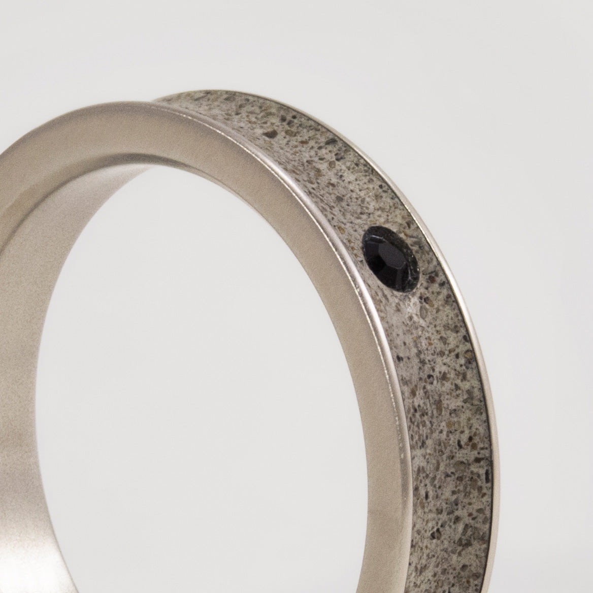 Gray concrete & titanium with crystal ring