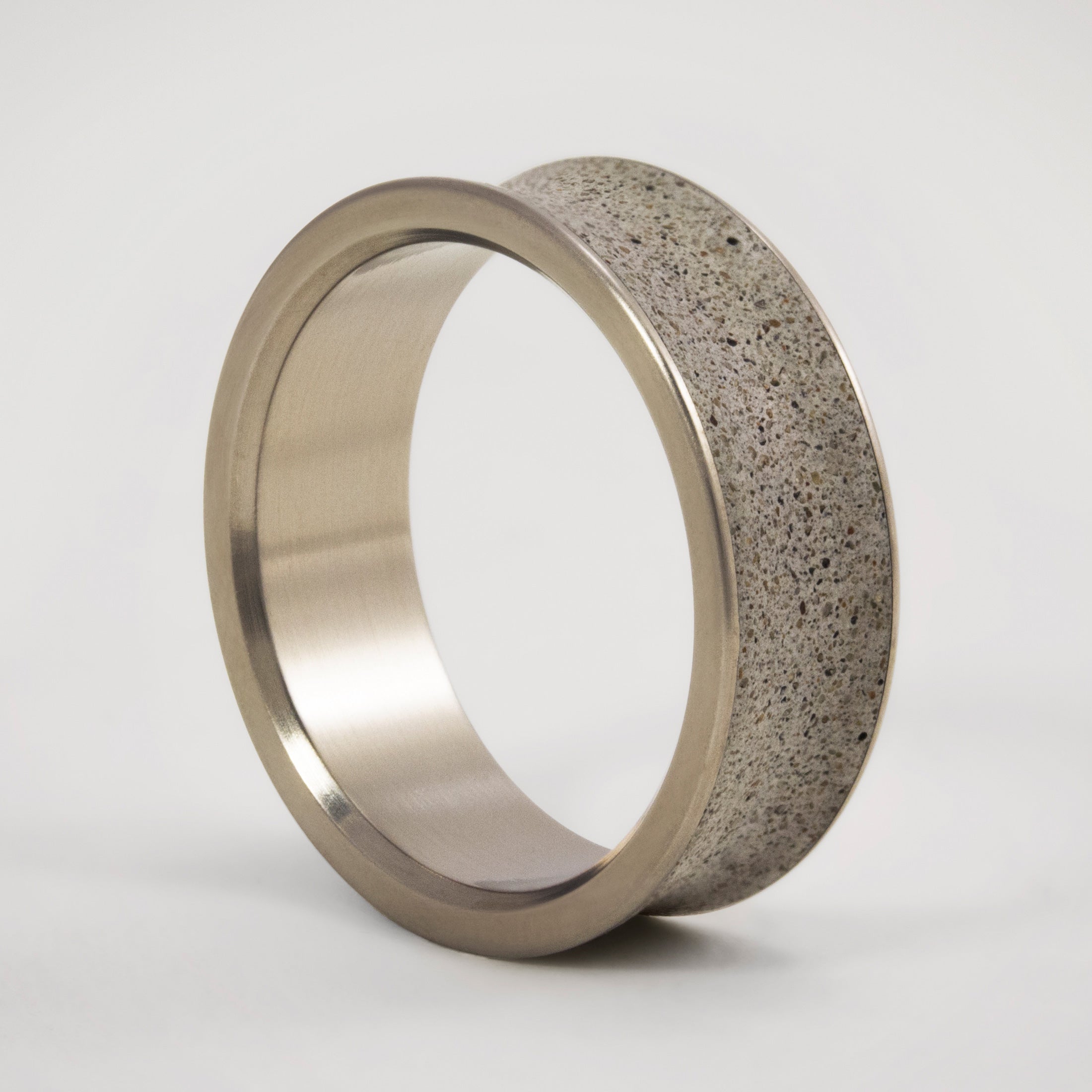 Gray concrete & titanium ring