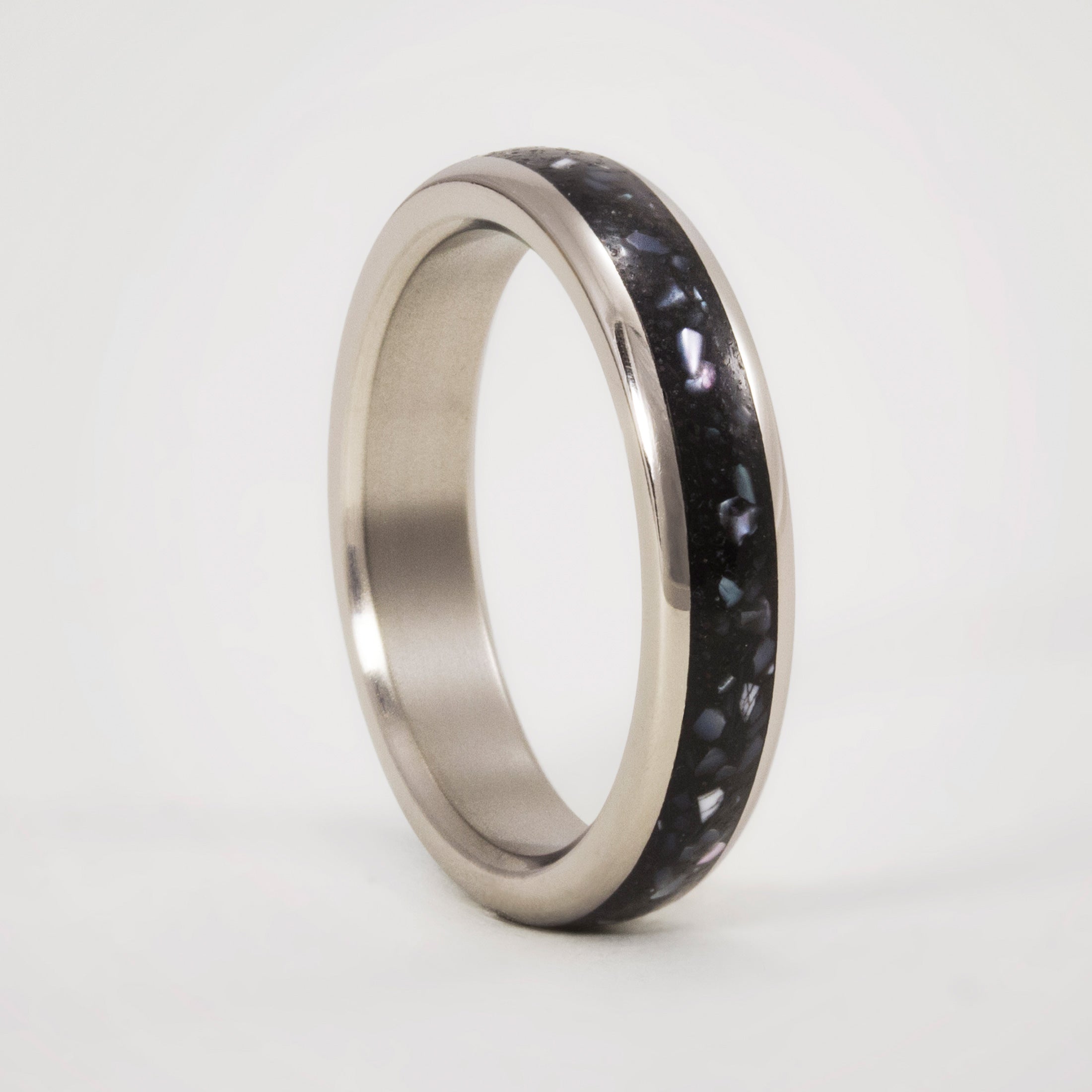 Nacre, black concrete and titanium women ring