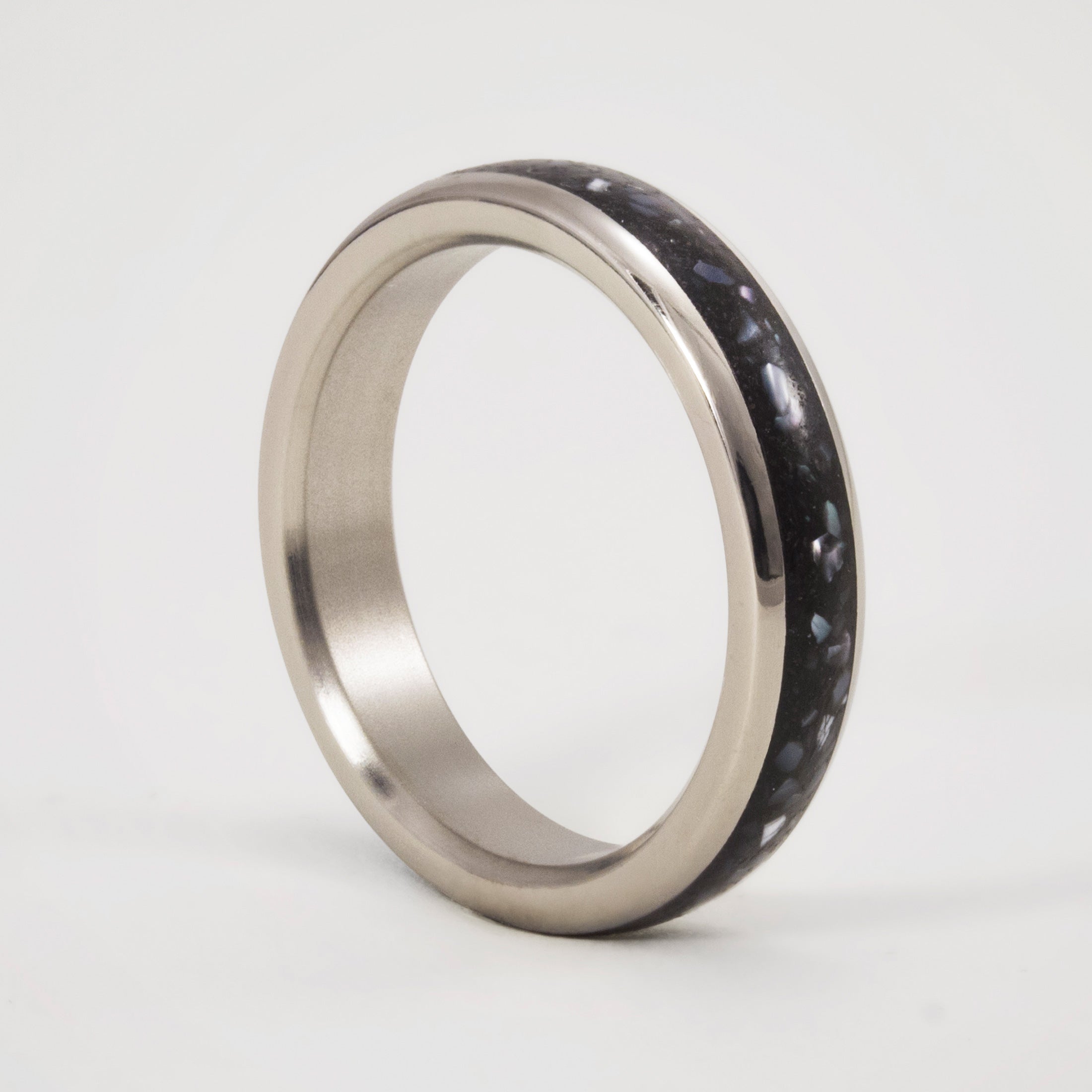Nacre, black concrete and titanium women ring