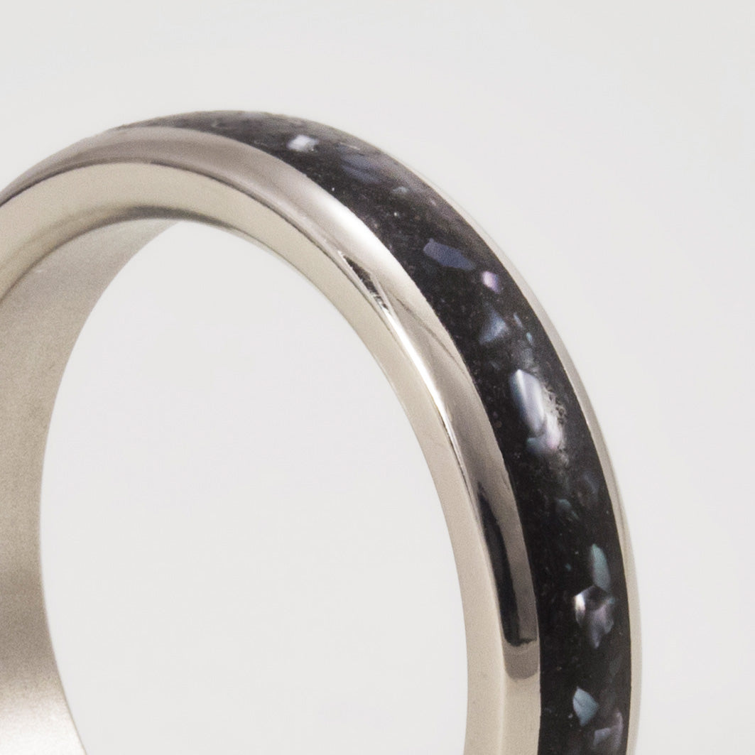 Nacre, black concrete and titanium women ring