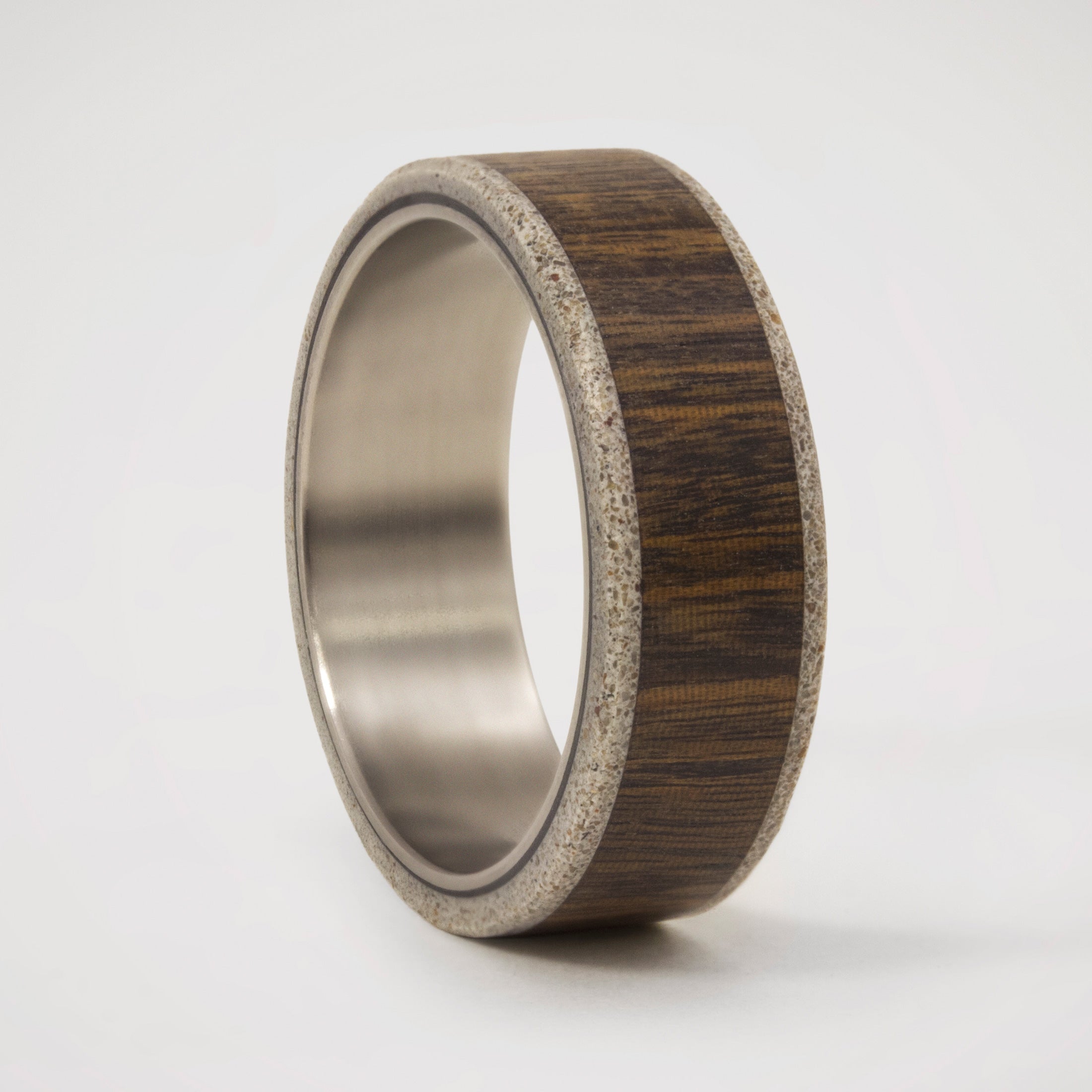 wood, gray concrete and titanium men ring
