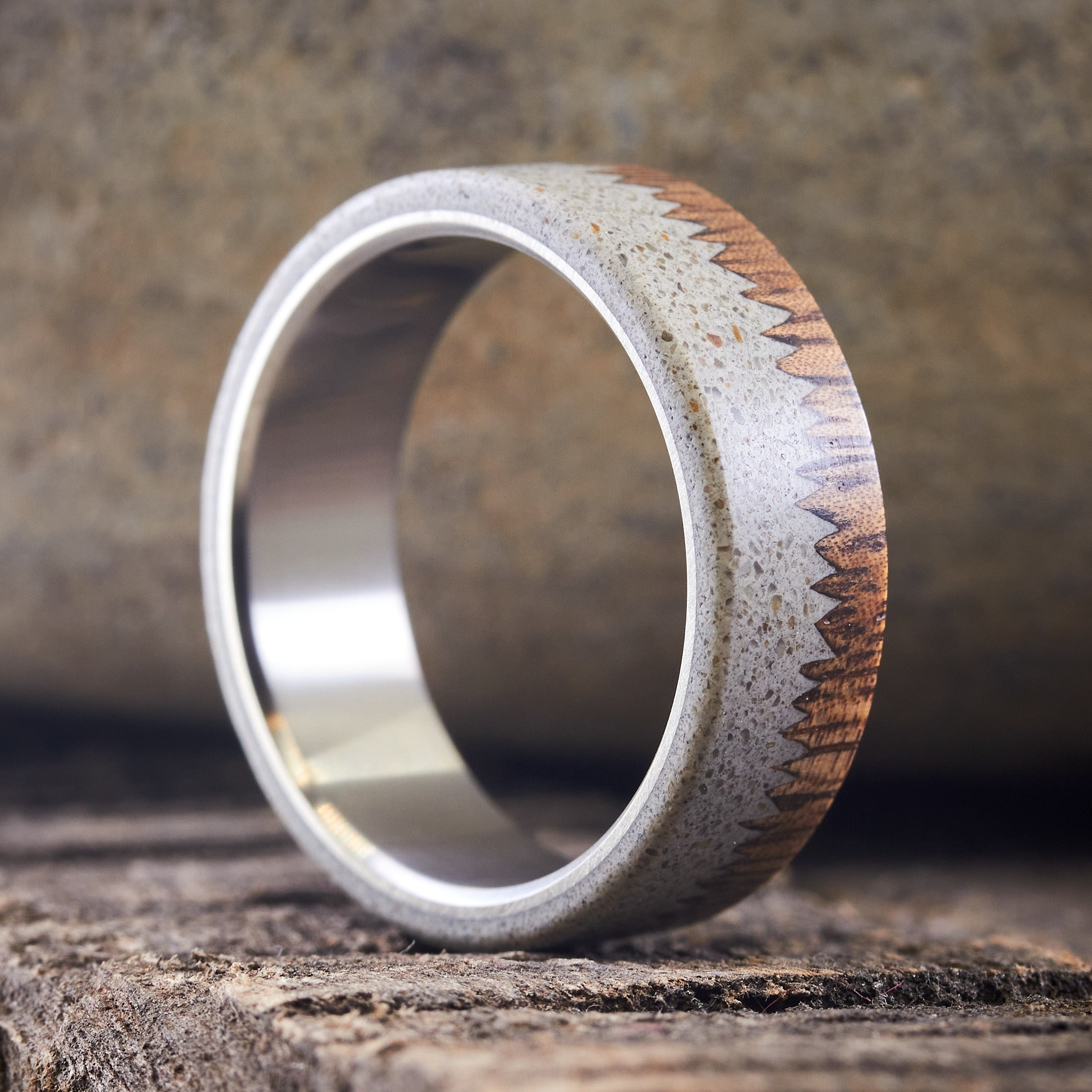 Gray concrete, wood & titanium ring