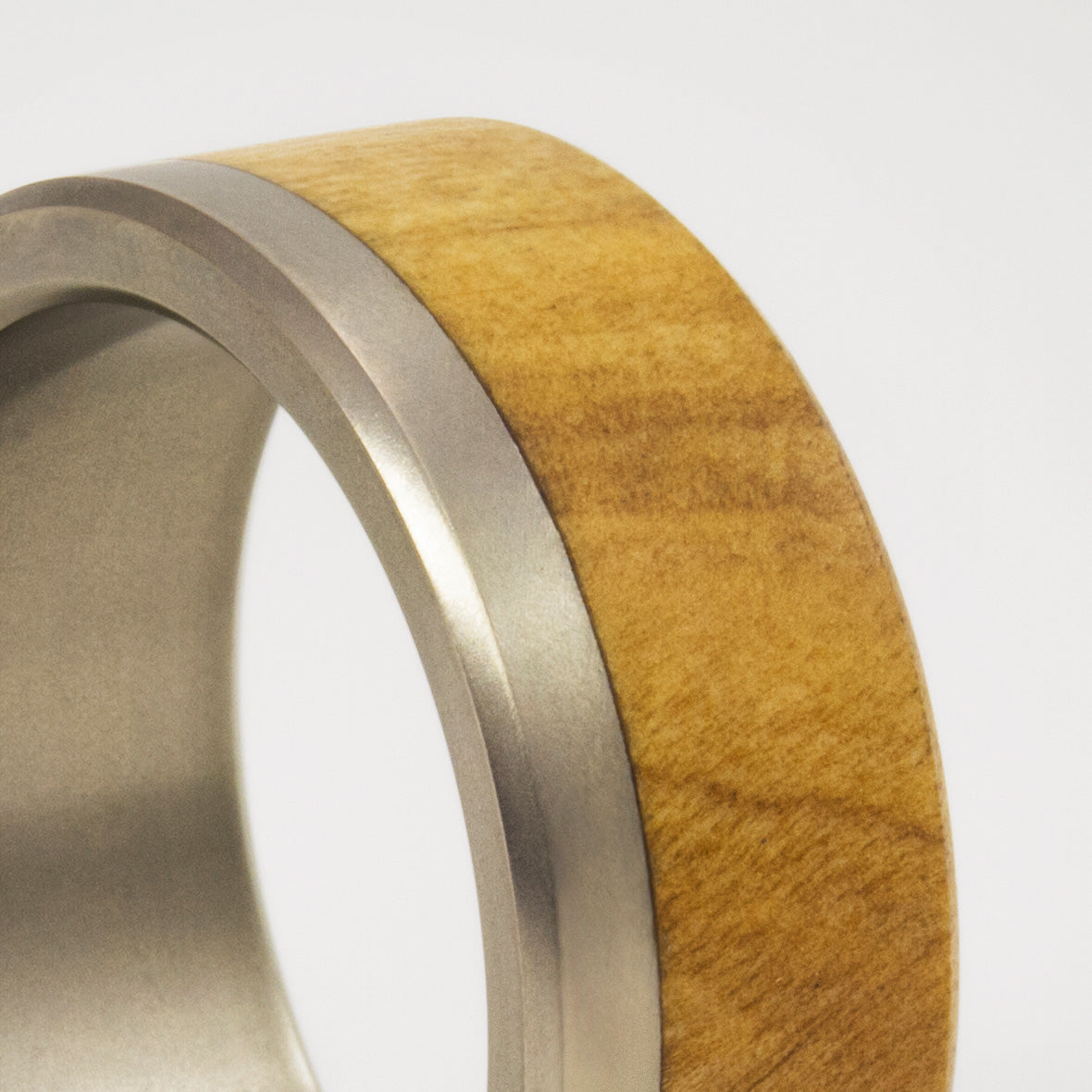 olive wood and matte titanium ring