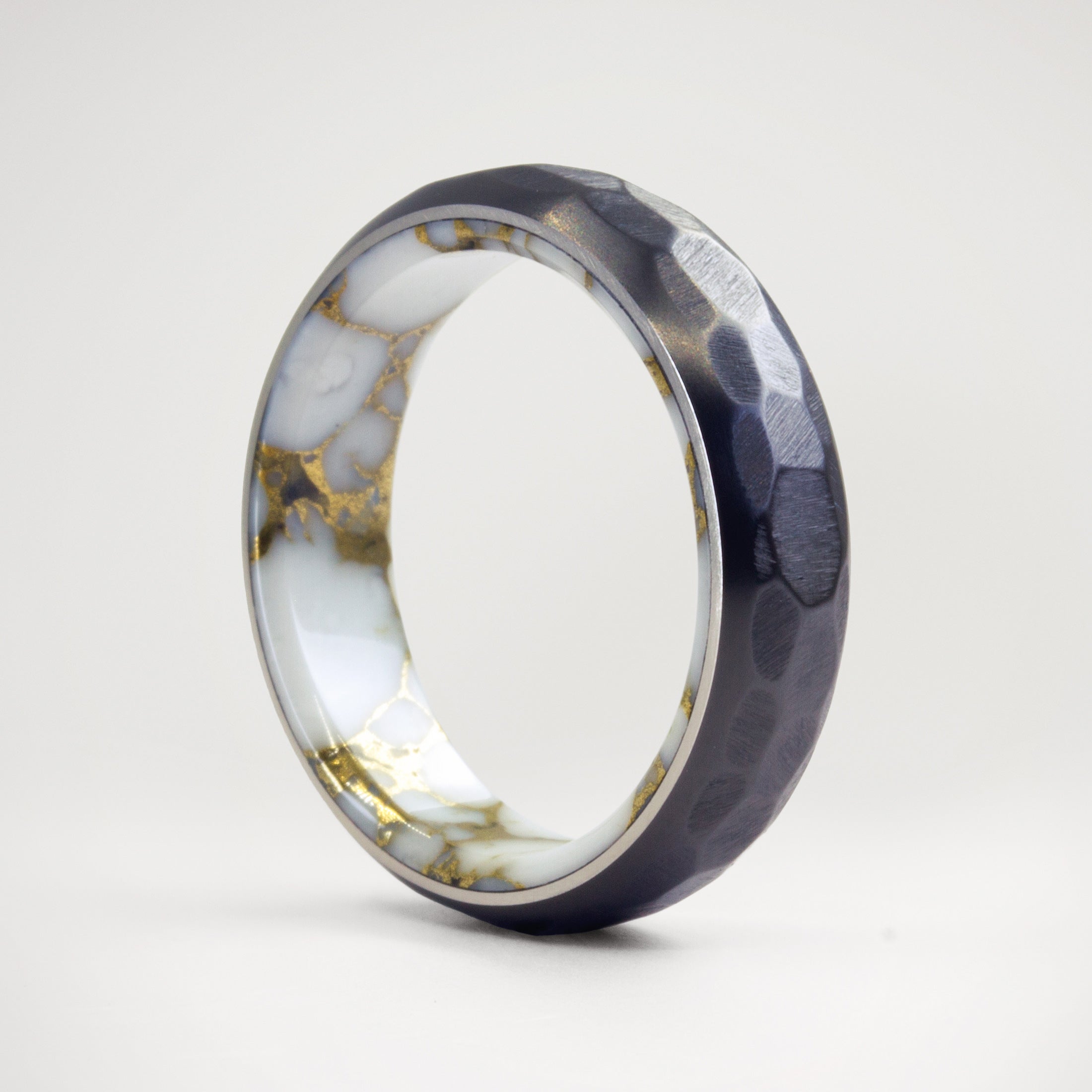 Hammered Black Zirconium & White Trustone ring