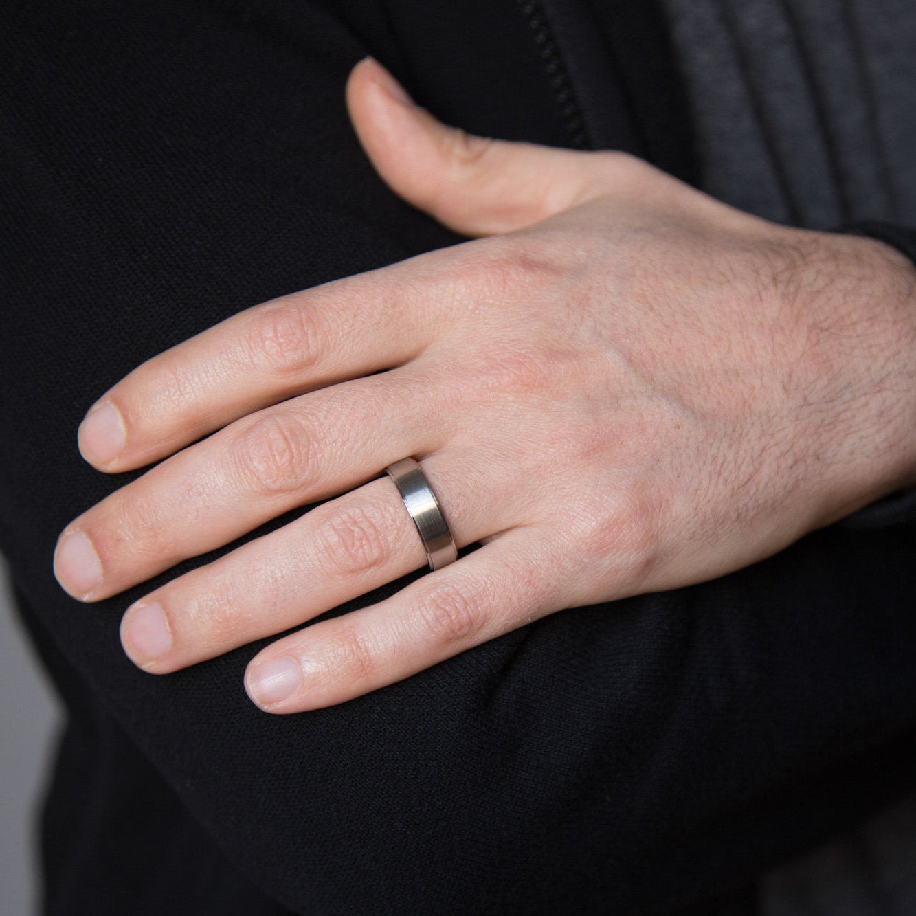 Brushed titanium ring with polished edges in bas-relief Ring - Loreto Rings 